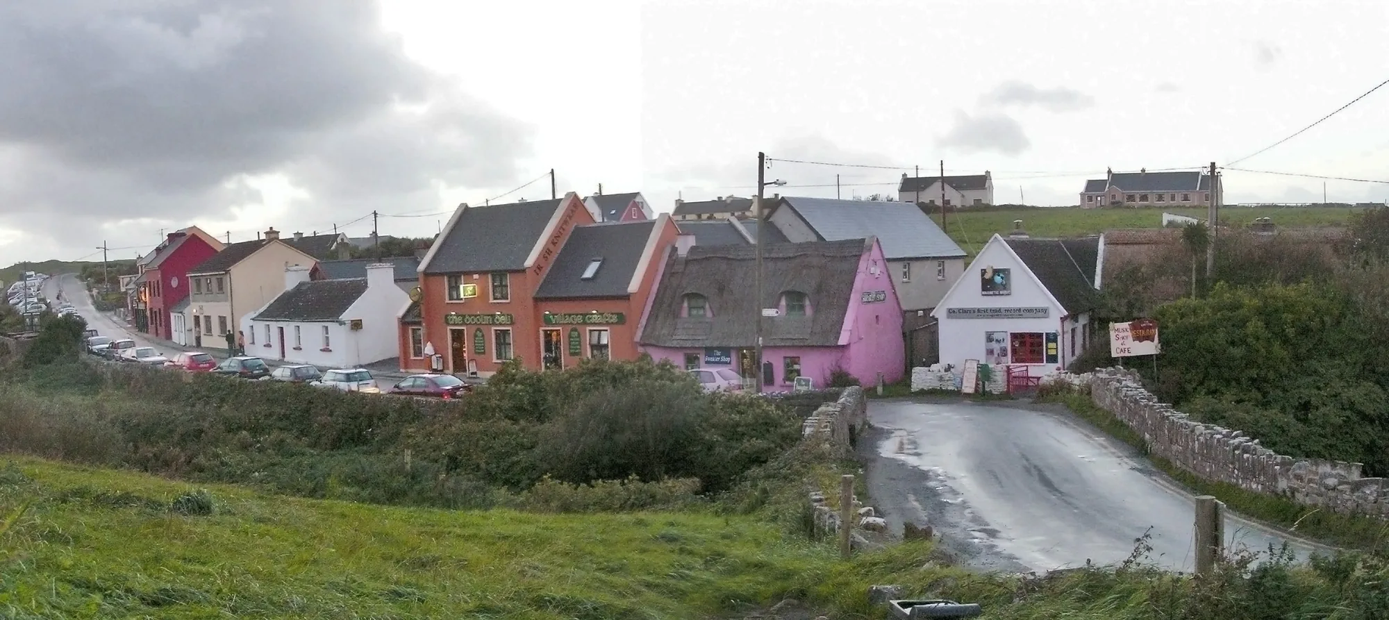 Road and colourful buildings in Doolin, County Clare
